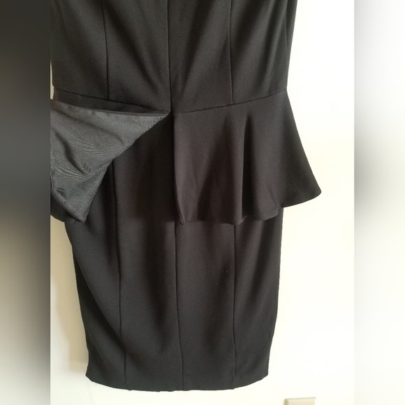 Black Peplum Dress with Keyhole Back by Bebe - size medium - Picture 3 of 7